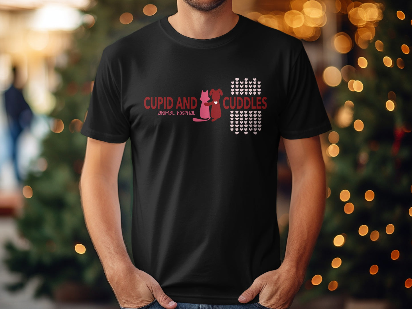Black t-shirt with "CUPID AND CUDDLES ANIMAL HOSPITAL" and pink cat and dog graphics.
