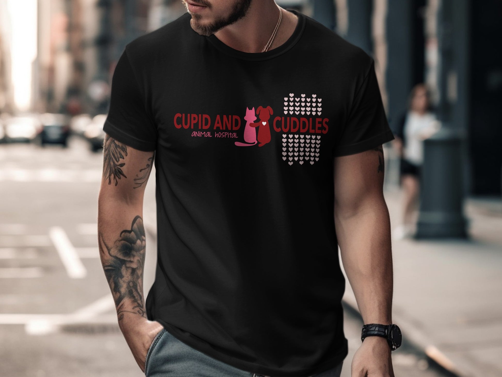Black t-shirt with "CUPID AND CUDDLES" and animal hospital text, heart accents.