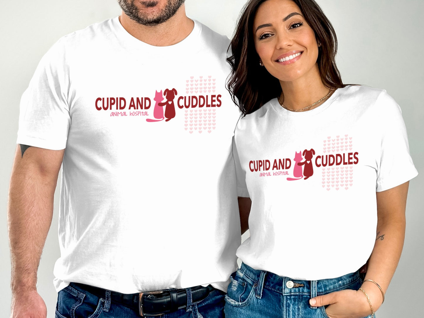 White t-shirts with "CUPID AND CUDDLES ANIMAL HOSPITAL" logo and heart pattern.